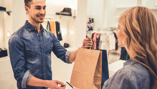 man at store checkout